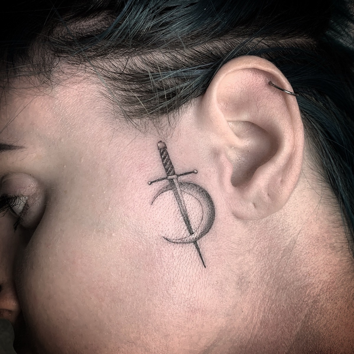 Dagger and crescent moon — tattoo by Scott Denhalter
